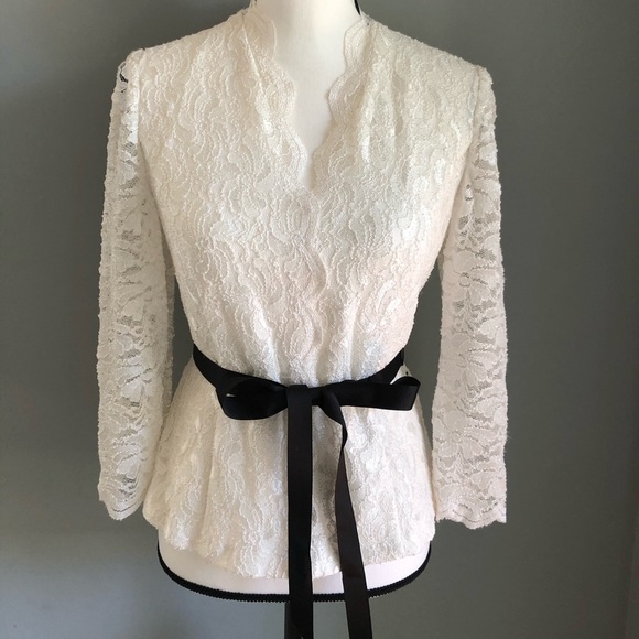 Elegant white lace top with black ribbon self tie. - Picture 1 of 7